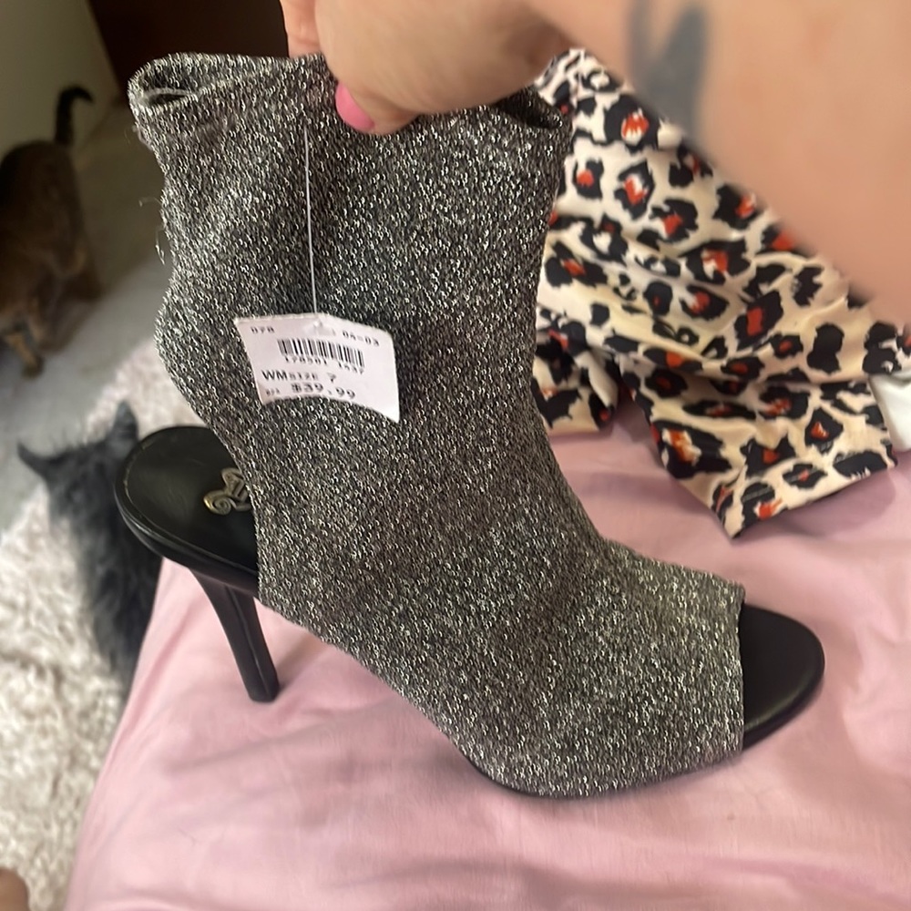 Size 7 heels slides on like socks silver/black brand new